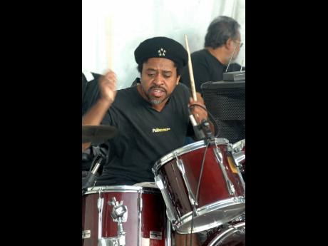 Drummer Desi Jones performing with Dr Cathy Brown and friends at the Emancipation Park Joggers Early Morning Concert in the Park.