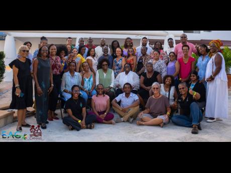 Participants at the recent summit, co-hosted by CANARI, enjoy a photo moment.
