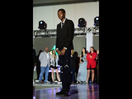 Credit: Antoine Lodge Deandre Carr, the newest male winner of the Saint Fashion Face of the Caribbean Competition.