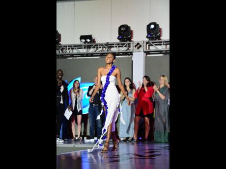 Credit: Antoine Lodge Beaming, Bianca Baccas was the picture of delight when her name was called as the third-place female winner.