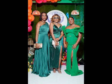 It’s a green luxury affair for these three beauties of Cumax Wealth (from left) Tamara Mitchell, Lavern Johnson, and Shanoya Wilson.