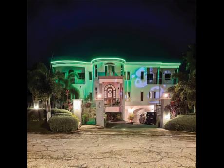 A futuristic mega mansion with the very latest in home technology, all remotely controlled from anywhere, by a cellphone.