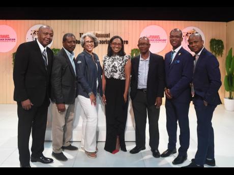 From left: Prince Graham Haynes, acting head of school; Frederick Mills, lecturer; Kim Mair, JMMB Joan Duncan Foundation CEO; Martha Miller, NRJ CEO; Horace Williams, lecturer; Dr Kevin Brown, president of the University of Technology; and host George Davi