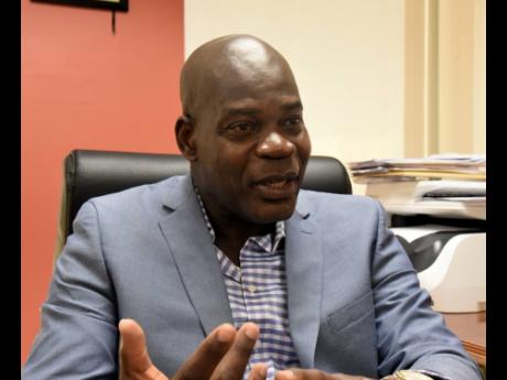 
Deputy Commissioner of Police Fitz Bailey taking a trip down memory lane with The Sunday Gleaner on Friday.