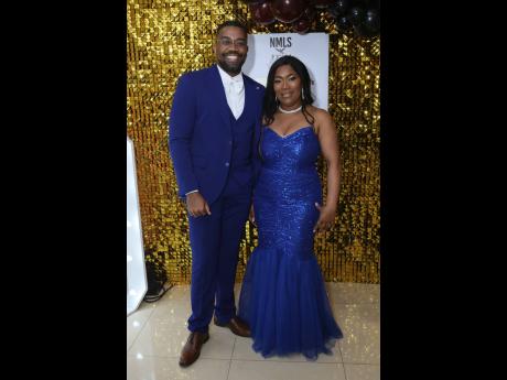 Credit: Nathaniel Stewart Adding a touch of blue to the gala are Fabian Shackleton and Shellie Leon, CEO and registrar at the Companies Office of Jamaica.