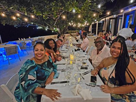 Rib Cage’s Gariel Ferguson (second right), his wife Gillian (left) and family members and friends at the Cliff Hotel Gourmet Getaway Wine Dinner.