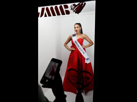 Credit: Contributed Shanneil Limonious, a candidate for the 2024 Miss Universe Jamaica pageant, is the picture of elegance.