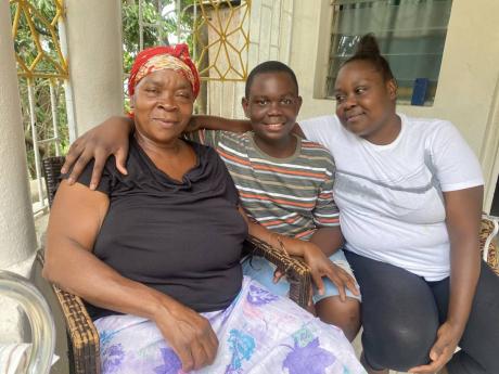  Antowne and his grandmother, Beverly Barrett (left) and aunt, Natalie Williamson.