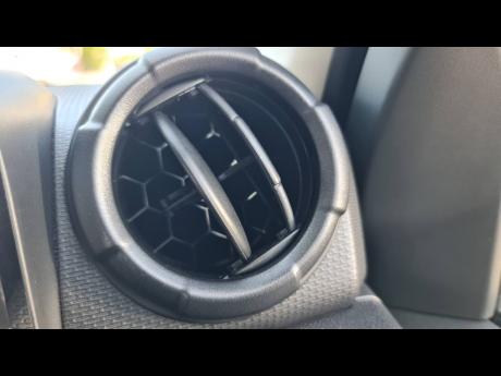 Classic circular air conditioning vents add a touch of nostalgia to the Jimny’s interior.