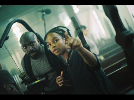 Director Williams, on set of her short film ‘Out of Many’ with director of photography Darren Scott.
