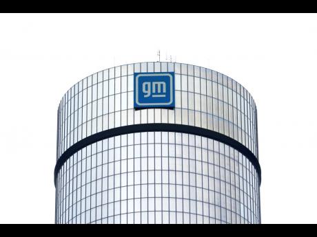 A General Motors logo is seen on a building on April 24, 2024 in Detroit.