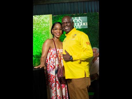 Credit: Contributed Simone Clarke (left), popular host and media personality and Norman Grant, chief executive officer, Jablum Coffee House, paused for a photo op.