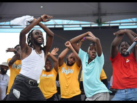 Dwight ‘DJ Brainz’ Francis (right) delivered dance moves and lyrics as he hit the stage with Laa Lee.
