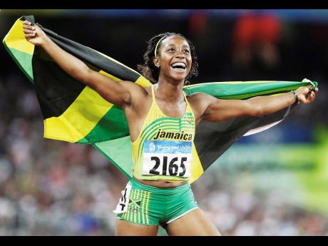 Credit: File Shelly-Ann Fraser-Pryce celebrates after winning gold in the 100 metres at the 2008 Beijing Olympics.