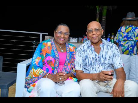 Gordon’s Agency’s Patricia and Wesley Gordon donned vibrant tropical prints. 