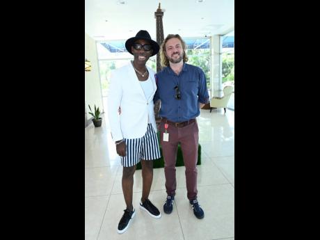 Deiwght Peters (left), founder of SAINT International, and Antoine Simenel, deputy head of mission at the French Embassy, share a joyful photo with bright smiles.