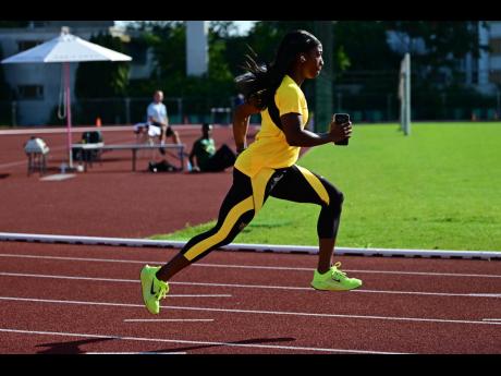 Credit: Gladstone Taylor Shelly-Ann Fraser-Pryce at a training session at the Complexe sportif de l’île des Vannes in Paris, France, yesterday.