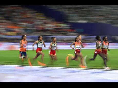 Speed to burn, Beatrice Chebet (third right) makes her move in the women’s 10,000 metres final on Friday.