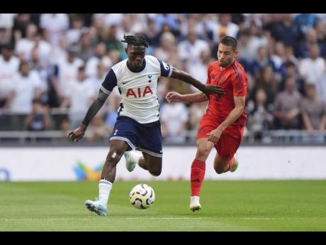 Credit: AP Yves Bissouma (left) in action for Tottenham Hotspur during a friendly match against Bayern Munich at the Tottenham Hotspur Stadium on Saturday, August 10.