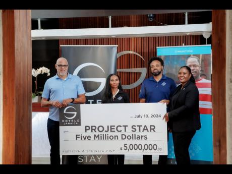 Credit: Contributed Shannice Bromfield (right), group finance director, Crissa Group, presents a donation cheque to Stacey Manicksing (second left), Project STAR donor relations lead, Keith Duncan (left), Project STAR co-chair, and Kalando Wilmoth (second right), Project STAR
