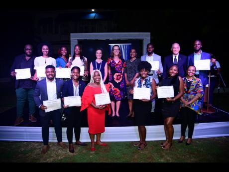Credit: Antoine Lodge/Photographer Senator Kamina Johnson Smith (back row, fifth left), minister of foreign affairs and foreign trade; Judith Slater (back row, fifth right), British high commissioner to Jamaica; Marsha Smith (fourth right), minister of state in the Ministry of Education and