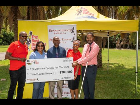 Participating in the handover by Running Events Jamaica of a cheque for $300,000 as part proceeds from the recent The Best Dressed Chicken/Everyone’s A Winner 3K and 5K Run are (from left) Alfred ‘Frano’ Francis, race director and CEO, Running Events