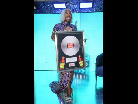 Magnum presents Spice, Queen of Dancehall, with a special award for Championing Dancehall Culture for 25 years during the launch of her studio album ‘Mirror 25’ in August.