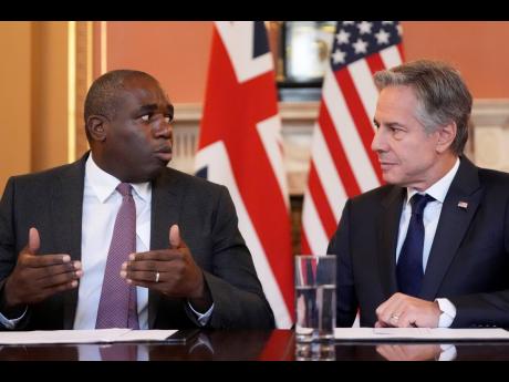 US Secretary of State Antony Blinken (right) listens to Britain’s Foreign Secretary David Lammy, in a strategic dialogue meeting at the Foreign, Commonwealth and Development Office in London yesterday. 