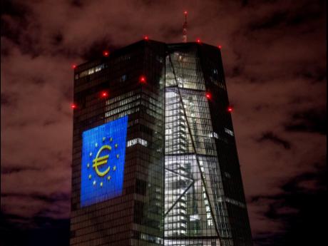 
A light installation is projected onto the building of the European Central Bank, as seen during a rehearsal in Frankfurt, Germany, December 30, 2021.