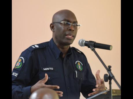Credit: Ian Allen/Photographer Superintendent of Police in charge of St Elizabeth, Coleridge Minto, making a report during last Thursday’s sitting of the St Elizabeth Municipal Corporation.