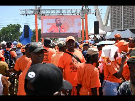 People’s National Party supporters gather at the party’s conference at the National Arena on September 15.