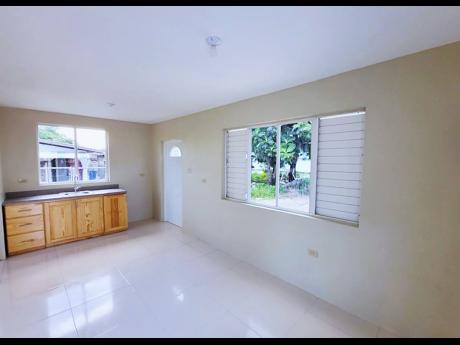 Credit: Contributed The interior receives plenty of light from the sliding glass windows.