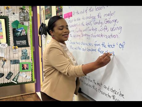 Credit: Contributed Richards writing on a white board.