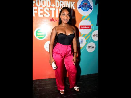 Operations Manager of Sandals Resorts, Shante Dricketts, is pretty in hot pink and black.