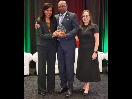 Credit: Contributed Tourism Minister Edmund Bartlett receiving the Caribbean Hotel and Tourism Association President’s Award for Caribbean Excellence in Tourism (2023).
