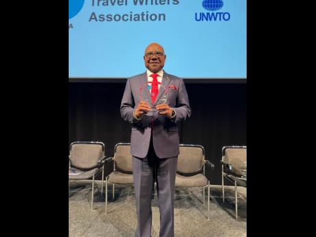 Credit: Contributed Tourism Minister Edmund Bartlett with his Pacific Area Travel Writers Association International Travel Awards Lifetime Achievement Award For Promotion of Sustainable Travel & Tourism (2023).