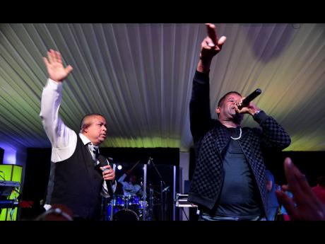 Junior Tucker (left) and Papa San on stage at  Tucker’s album launch and birthday bash held on Saturday at Swallowfield Chapel in Kingston.