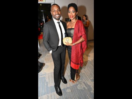 Christopher Samuels, Scotia’s regional director for Jamaica Retail District B, and Natalee Passelle, founder of M&N Support Services, pair up for a quick photo.