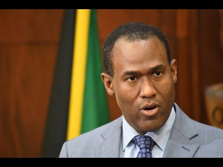 Dr Nigel Clarke, minister of finance and the public service. 