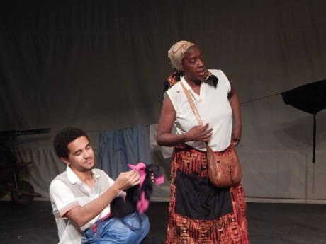 Swiss Cheese (Jesse McClure) gets counselling from his mother, Madda Courage (Carolyn Allen), in this scene from the School of Drama production of  Brecht’s ‘Mother Courage and Her Children.’