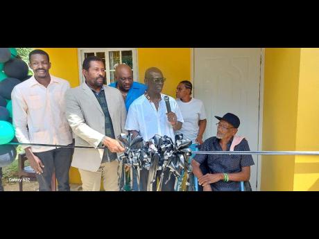 From left: Amorkard Brown, councillor for the Leamington Division; Daniel Lawrence, Member of Parliament, Westmoreland Eastern; Danree Delancy, Mayor of Savanna-La Mar; and Desmond McKenzie, Minister of Local Government share in a happy moment with Lloyd E