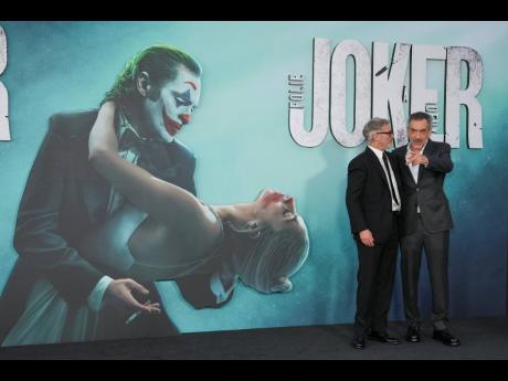Joaquin Phoenix (left), and Todd Phillips arrive at the premiere of ‘Joker: Folie a Deux’ at TCL Chinese Theatre in Los Angeles. 