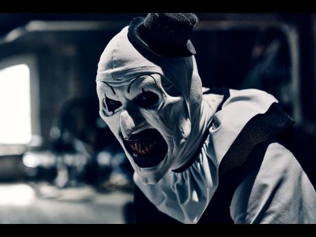 This image released by Cineverse Entertainment shows David Howard Thornton in a scene from ‘Terrifier 3’.