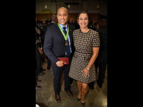 Paul Simpson (left), president and chief executive officer, Cornerstone, shares a moment with wife, Tanya, after he collected his national award. Simpson was inducted into the Order of Distinction in the rank of Commander. 