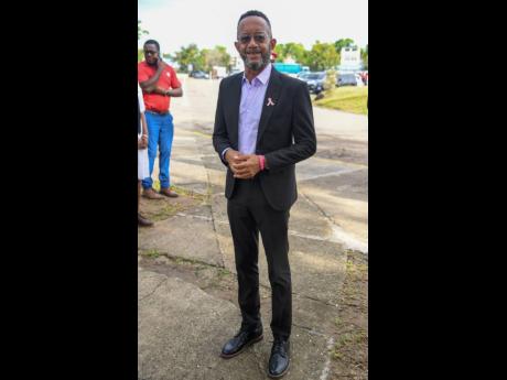 Television Jamaica presenter and schoolboy football coach Neville Bell supported his sister, Dr Camille Bell-Hutchinson, who was conferred with the Order of Distinction in the rank of Officer. 