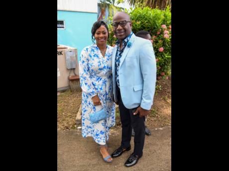 The lovely couple, Dennis Brooks (right) and wife, Susan Wilson Brooks, matched in shades of blue and white. 