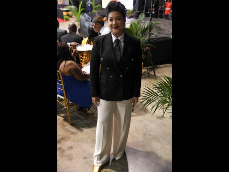 Songbird Tessanne Chin is styled by Syntyche Clarke’s StylePhyle Global in a double-breasted blazer and trousers for her performance at the annual event.