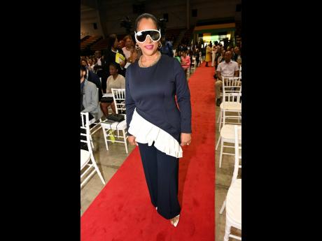 Natalie St Louis, strategic corporate consultant and founder of Strategic Konnections and Management Services Ltd, showed off her futuristic sunglasses. 