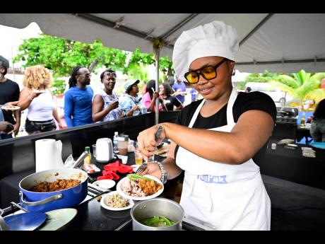 Contestant Kelly Shane plates her traditional rice and peas and vegetables to accompany the star of the show, her veggie chunks.