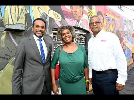 Monique Blake, director of Merritone Music, is flanked by Dr Carey Wallace (left), executive director of the Tourism Enhancement Fund (TEF), and Peter Mullings, deputy director of tourism marketing, of the Jamaica Tourist Board.
